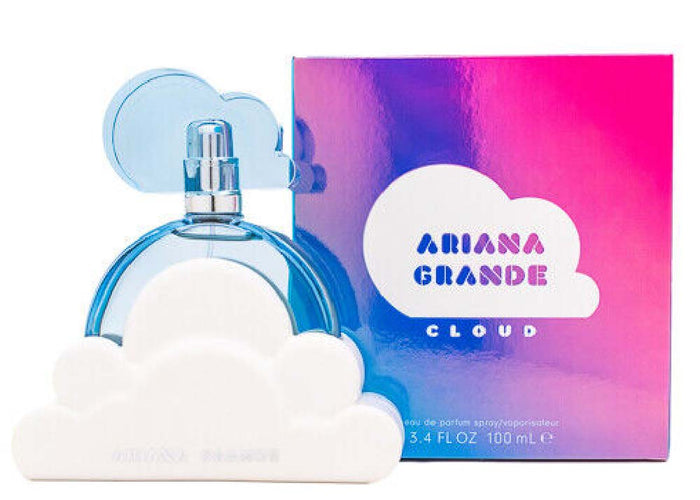 Ariana Grande Cloud perfume bottle and packaging, with the bottle displaying a blue cloud on a white base and the packaging in shades of pink and blue.