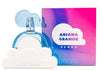 Ariana Grande Cloud perfume bottle and packaging, with the bottle displaying a blue cloud on a white base and the packaging in shades of pink and blue.